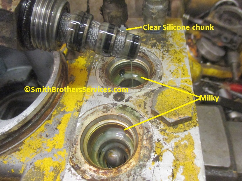 Meyer plow fluid milky in system